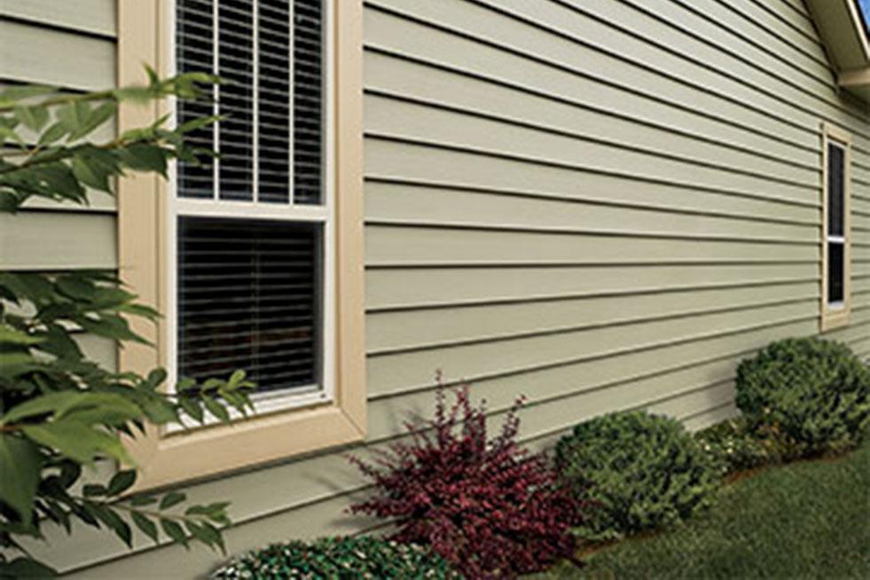 Vinyl-Siding-360x270-compressed_0 Side of home with green Certainteed Vinyl Siding